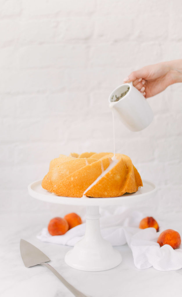A fresh and light peach bundt cake recipe from Lauren Cermak of the Southern Lifestyle Blog, Going For Grace. Savor every moment of peach season with this easy bundt cake recipe!