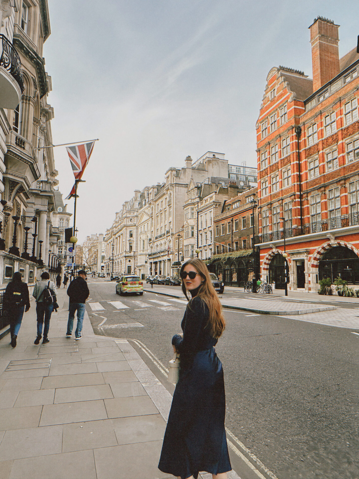 Woman walking down the streets of London, England.